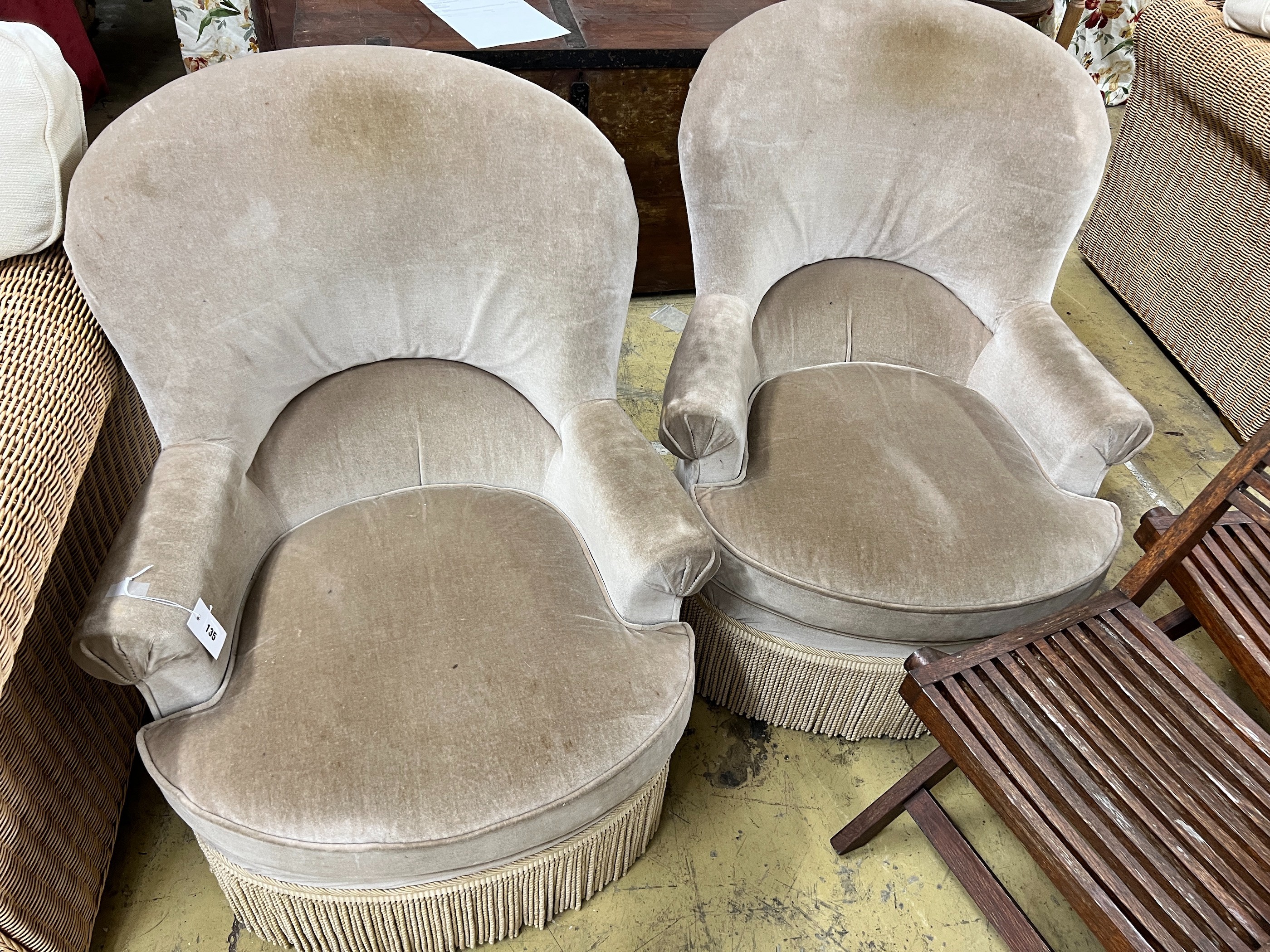 A pair of upholstered tub framed side chairs, width 70cm, depth 70cm, height 88cm